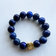 Load image into Gallery viewer, Welcome to the Elemental Elegance collection! Nature-inspired jewelry, where gemstones meet the timeless wisdom of the elements. Water – serene and powerful, just like a flowing river, the calming allure of moonstone, lapis and aquamarine, reminding you to go with the flow and embrace life's currents with grace. Each lapis lazuli bracelet is made with real quality gemstones and a gold filled element bead
