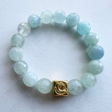 Load image into Gallery viewer, Welcome to the Elemental Elegance collection! Nature-inspired jewelry, where gemstones meet the timeless wisdom of the elements. Water – serene and powerful, just like a flowing river, the calming allure of moonstone, lapis and aquamarine, reminding you to go with the flow and embrace life's currents with grace. Each aquamarine bracelet is made with real quality gemstones and a gold filled element bead
