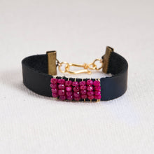 Load image into Gallery viewer, Absolutely stunning gemstone faceted stones hand wrapped with 14kt gold filled or sterling silver wire on a leather cuff with a gold filled or sterling silver lobster claw and chain closure. Bracelets measure seven inches but can be customized upon request. Can be customized with other gemstones upon request