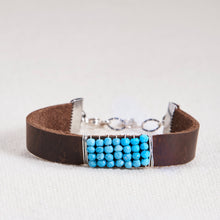 Load image into Gallery viewer, Absolutely stunning gemstone faceted stones hand wrapped with 14kt gold filled or sterling silver wire on a leather cuff with a gold filled or sterling silver lobster claw and chain closure. Bracelets measure seven inches but can be customized upon request. Can be customized with other gemstones upon request