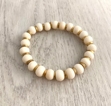 Load image into Gallery viewer, Made from natural materials and gemstones, these stacking bracelets are a perfect addition to your current arm party Wear alone or add to your favorite stack Our bracelets are 7", which fits small to medium adult wrists. I use a strong, stretch cord for a nice, comfortable fit.