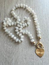 Load image into Gallery viewer,  Discover the ethereal allure of our 18-Inch Hand-Knotted Faceted Moonstone Necklace with Gold-Filled Clasp. Immerse yourself in the enchanting world of celestial beauty and adornment. Shop now for an exquisite piece that transcends time and captivates hearts