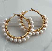 Load image into Gallery viewer, 1.5 inch 24kt gold filled hoops are hand wrapped with gorgeous faceted gemstones. These handcrafted earrings provide just the right amount of sparkle to make any outfit shine The earrings include AAA quality gemstones, they are natural, undyed, superbly faceted and vibrant