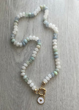 Load image into Gallery viewer, Immerse yourself in the freshness and purity of the "Meggy" Necklace. Hand-knotted on white silk thread, this 18-inch necklace features moonstones, aquamarine, aventurine, and opals, creating a soothing and tranquil aura. The gold-filled end caps and sailor's clasp allow for easy on and off and personalization with your favorite charm. Embrace the freshness and elevate your style. Available now for purchase.