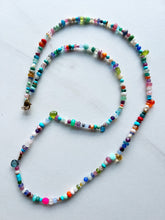 Load image into Gallery viewer, A multitude of miscellaneous gemstones for a necklace that is perfect for a white t shirt, bathing suit, sundress, blouse...you name it. Measures 30 inches and has a gold filled clasp to finish it off.   No two necklaces will ever be the same. If you have certain gemstones or colors you love please include in the notes. Length can be customized upon request