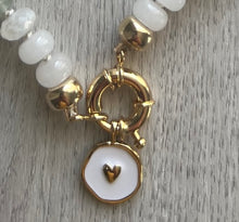 Load image into Gallery viewer, Immerse yourself in the freshness and purity of the "Meggy" Necklace. Hand-knotted on white silk thread, this 18-inch necklace features moonstones, aquamarine, aventurine, and opals, creating a soothing and tranquil aura. The gold-filled end caps and sailor's clasp allow for easy on and off and personalization with your favorite charm. Embrace the freshness and elevate your style. Available now for purchase.