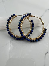 Load image into Gallery viewer, 1.5 inch 24kt gold filled hoops are hand wrapped with gorgeous faceted gemstones. These handcrafted earrings provide just the right amount of sparkle to make any outfit shine The earrings include AAA quality gemstones, they are natural, undyed, superbly faceted and vibrant
