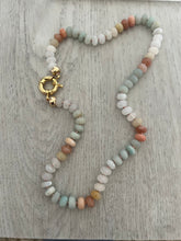 Load image into Gallery viewer, Discover the timeless elegance of the "Sophie" Necklace. Featuring green and peach aventurine and moonstones, this neutral jewelry piece is a must-have for any fashion enthusiast. The gold-filled sailor's clasp adds a touch of sophistication and versatility, allowing for easy on and off and the option to add a personal charm. Available in 18 and 20 inches. Shop now and elevate your style with this enchanting necklace.