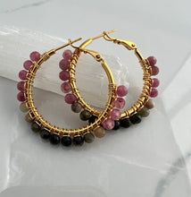 Load image into Gallery viewer, 1.5 inch 24kt gold filled hoops are hand wrapped with gorgeous faceted gemstones. These handcrafted earrings provide just the right amount of sparkle to make any outfit shine The earrings include AAA quality gemstones, they are natural, undyed, superbly faceted and vibrant
