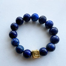 Load image into Gallery viewer, Welcome to the Elemental Elegance collection! Nature-inspired jewelry, where gemstones meet the timeless wisdom of the elements. Water – serene and powerful, just like a flowing river, the calming allure of moonstone, lapis and aquamarine, reminding you to go with the flow and embrace life&#39;s currents with grace. Each lapis lazuli bracelet is made with real quality gemstones and a gold filled element bead
