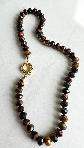 Experience luxury with this 19-inch faceted tiger eye necklace and its elegant gold-filled sailor clasp