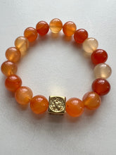 Load image into Gallery viewer, Welcome to the Elemental Elegance collection! Nature-inspired jewelry, where gemstones meet the timeless wisdom of the elements.  Fire – vibrant and intense. Ignite your passion with ruby and carnelian, inspiring you to chase your dreams with fiery determination.  Each carnelian bracelet is made with real quality gemstones and a gold filled element bead
