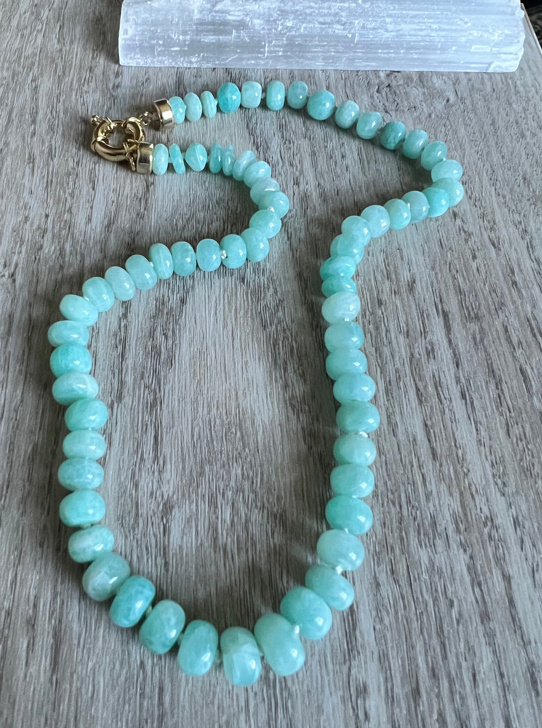 Hand knotted on white silk thread these 8mm natural Amazonite stones are knock outs.  This necklace can be styled for all seasons and will be sure to draw compliments.   It measures 18 inches and is finished off with gold filled end caps and a gold filled sailor clasp to allow for easy on and off and to add or remove your favorite charm 