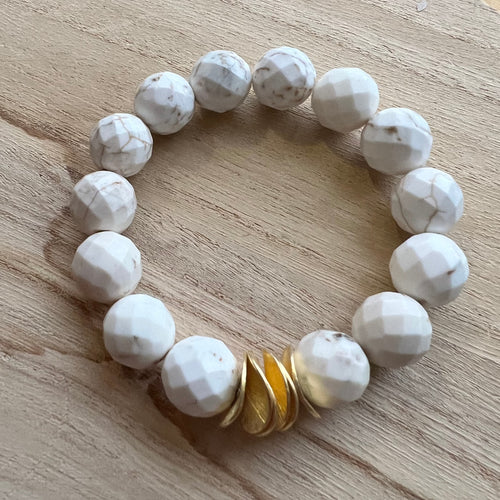 Made with 12mm gemstones and brushed gold plated copper discs these bracelets can be worn alone or with your favorite stack. Tiger eye, aquamarine, moonstone, howlite Bracelets measure 7 inches but can be adjusted upon request
