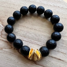 Load image into Gallery viewer, Made with 12mm gemstones and brushed gold plated copper discs these bracelets can be worn alone or with your favorite stack. Tiger eye, aquamarine, moonstone, howlite Bracelets measure 7 inches but can be adjusted upon request
