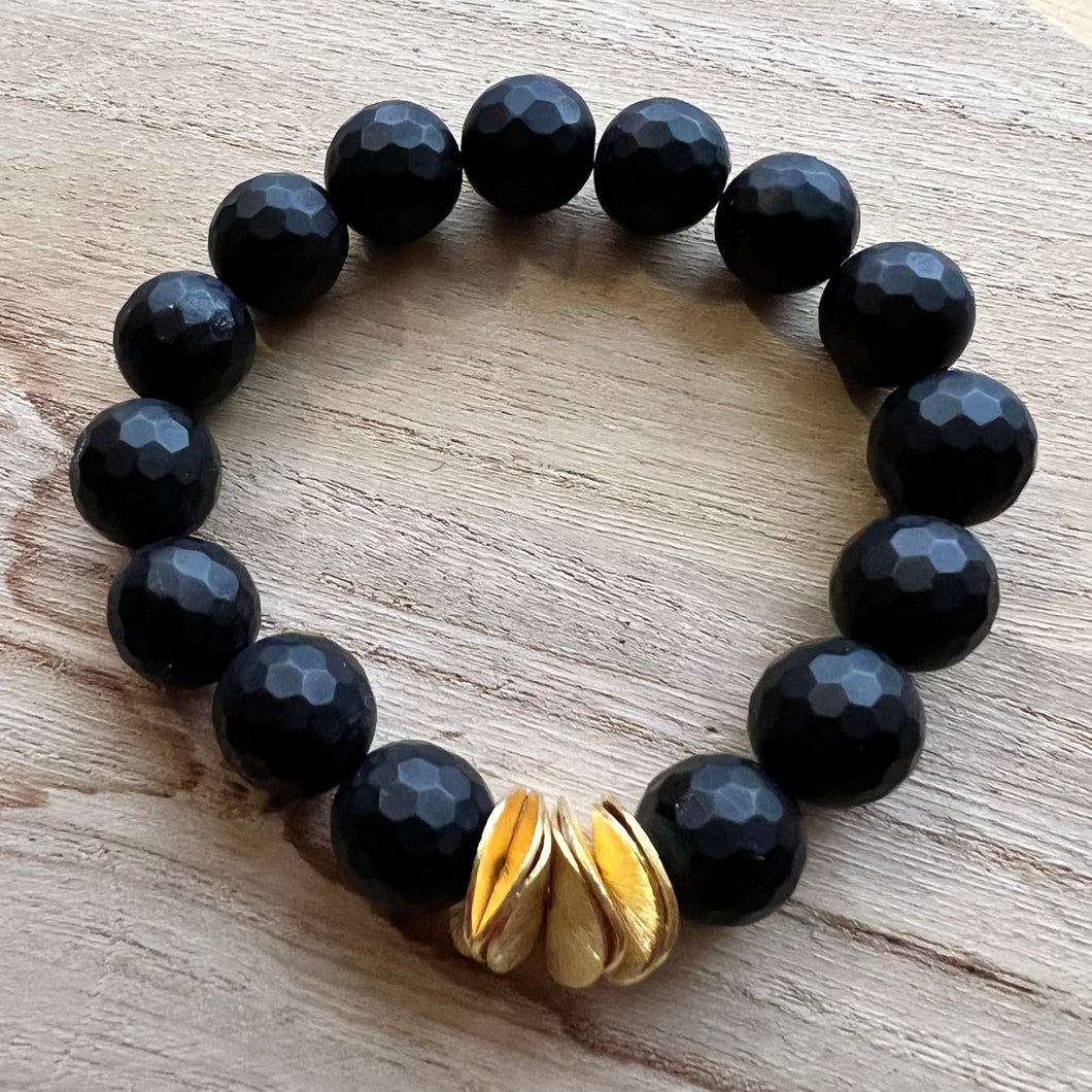 Made with 12mm gemstones and brushed gold plated copper discs these bracelets can be worn alone or with your favorite stack. Tiger eye, aquamarine, moonstone, howlite Bracelets measure 7 inches but can be adjusted upon request