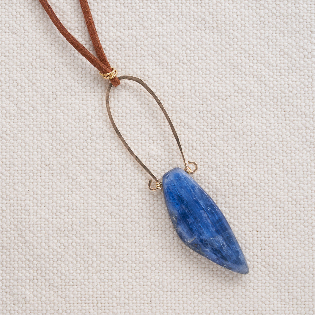 Gorgeous piece of kyanite with hand forged 14kt gold filled wire accent is hung from a long piece of brown leather cord to create a stunning boho style that will turn heads Necklace is approximately 27 inches long and can be customized with different lengths, leather color, chain and gemstones