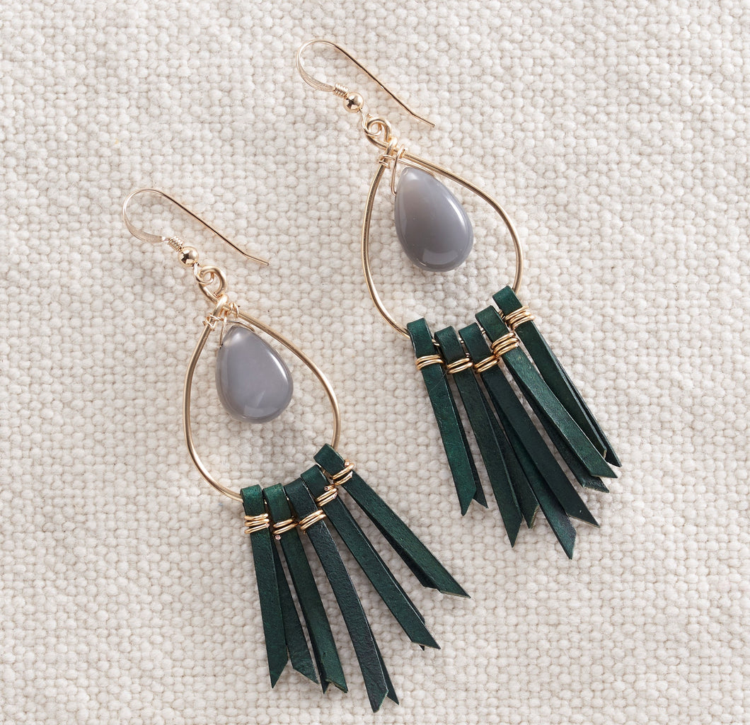 Smooth grey moonstone teardrops are a perfect match for the deep forest green leather.  The color contrast works nicely to create a great pair of statement earrings