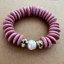 Load image into Gallery viewer, Matching bracelets with pink ashanti beads, a single fresh water pearl and carved star bone beads Mommy bracelet measures seven inches but can be customized upon request.  Mini bracelet will be customized. Please mention child’s age in the notes (default will be six inches)
