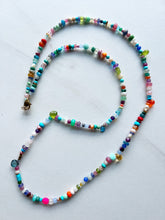 Load image into Gallery viewer, A multitude of miscellaneous gemstones for a necklace that is perfect for a white t shirt, bathing suit, sundress, blouse...you name it. Measures 30 inches and has a gold filled clasp to finish it off.   No two necklaces will ever be the same. If you have certain gemstones or colors you love please include in the notes. Length can be customized upon request 

