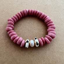 Load image into Gallery viewer, Matching bracelets with pink ashanti beads, a single fresh water pearl and carved star bone beads Mommy bracelet measures seven inches but can be customized upon request.  Mini bracelet will be customized. Please mention child’s age in the notes (default will be six inches)
