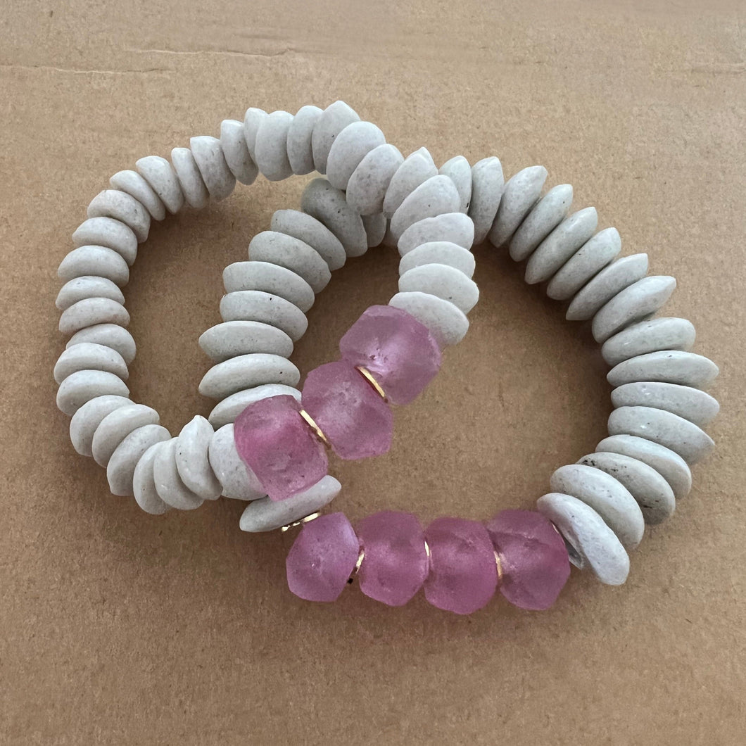 Matching bracelets with white Ashanti beads and pink recycled java glass  Mommy bracelet measures seven inches but can be customized upon request.  Mini bracelet will be customized. Please mention child’s age in the notes (default will be six inches)