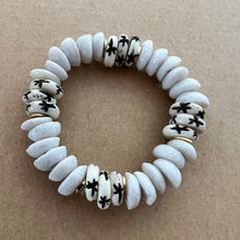 Load image into Gallery viewer, Matching bracelets with white ashanti beads with carved star bone beads Mommy bracelet measures seven inches but can be customized upon request.  Mini bracelet will be customized. Please mention child’s age in the notes (default will be six inches)
