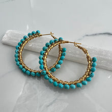 Load image into Gallery viewer, 2 inch 24kt gold filled hoops are hand wrapped with gorgeous faceted gemstones.  These handcrafted earrings provide just the right amount of sparkle to make any outfit shine The earrings include AAA quality gemstones, they are natural, undyed, superbly faceted and vibrant
